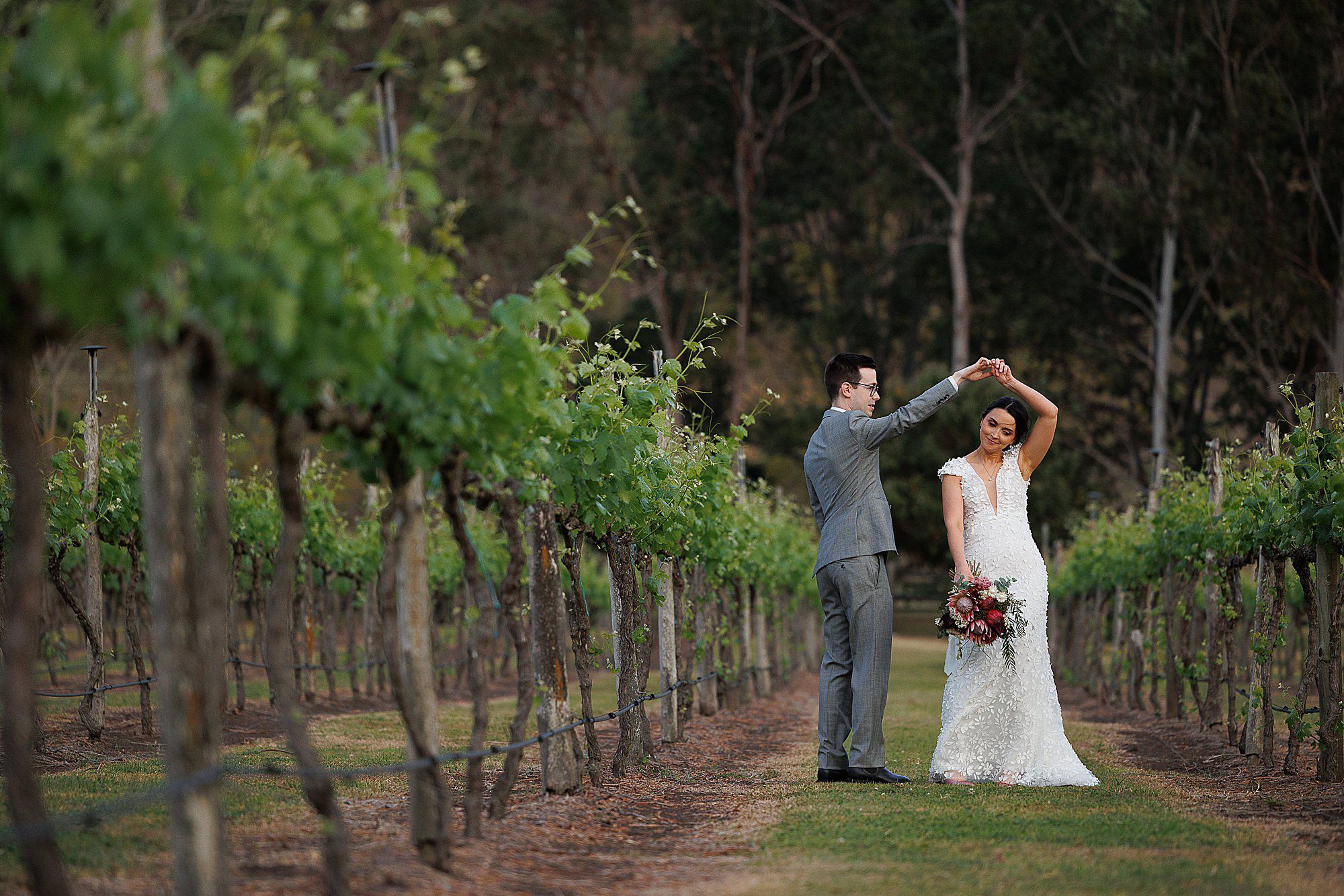 Bride & Groom dancing in Canungra Valley Vineyard