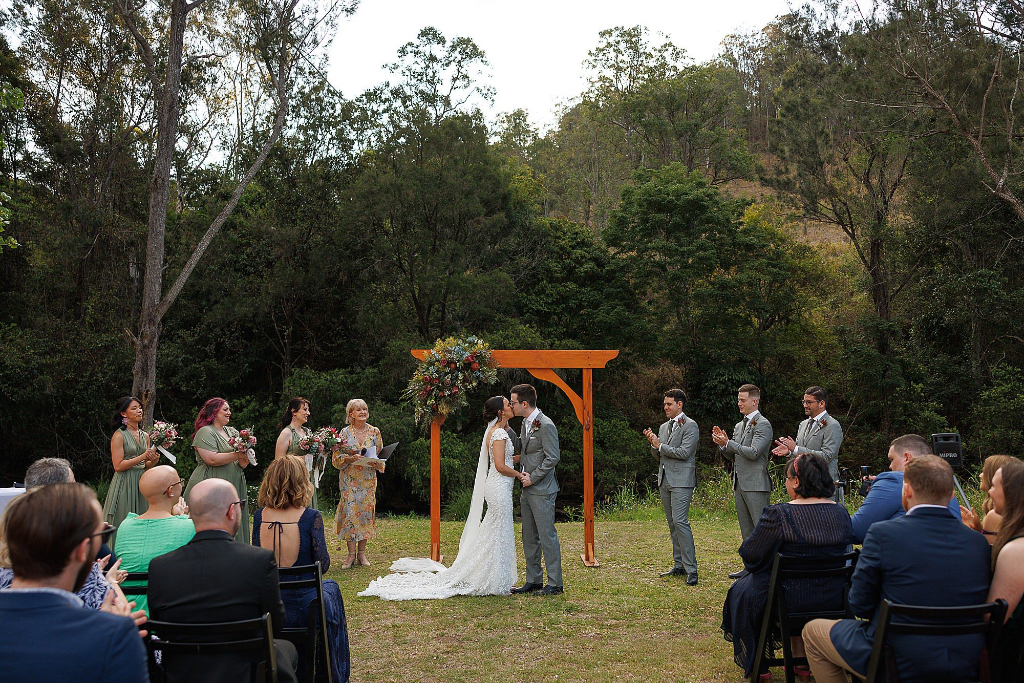 O'reilly's canungra valley vineyard wedding ceremony first kiss