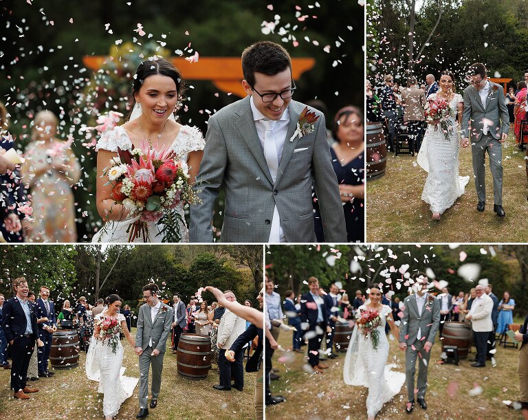O'reilly's canungra valley vineyard wedding ceremony with confetti being thrown